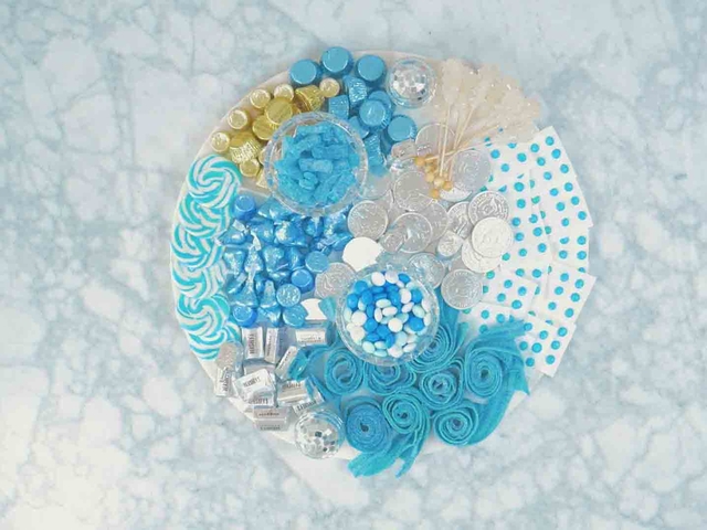 How to Put Together a Blue & White Candy Board for Hanukkah - Rebekah Lowin